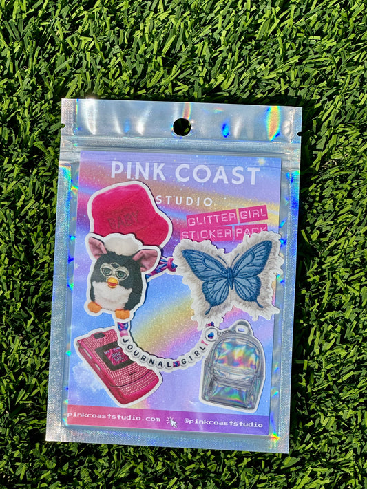 Pink Coast Studio glitter girl sticker pack on grass